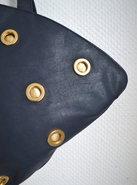 Sac marine à œillets dorés