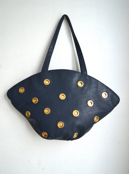 Sac marine à œillets dorés