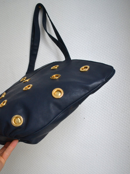 Sac marine à œillets dorés